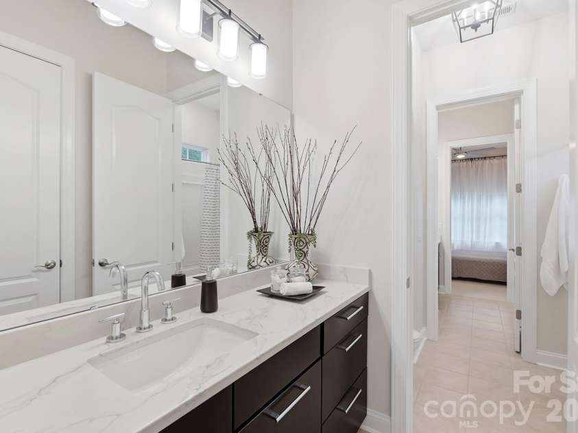 7717 Coalcliff Drive, Huntersville, NC 28078.  MLS# CAR4408239, YatesRealty ID 44254. Jack and Jill Bathroom