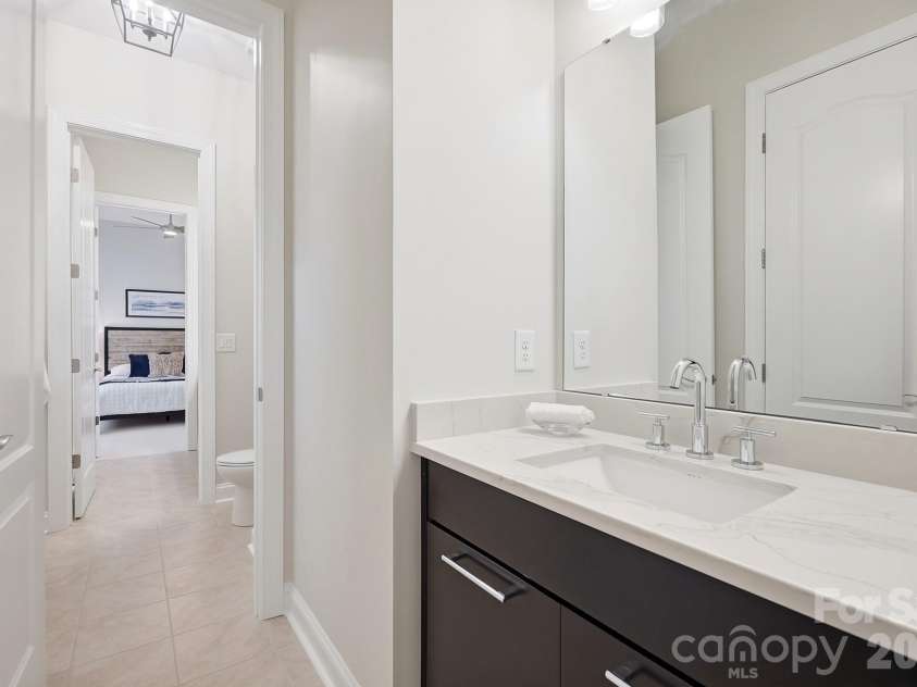 7717 Coalcliff Drive, Huntersville, NC 28078.  MLS# CAR4408239, YatesRealty ID 44254. Jack and Jill Bathroom
