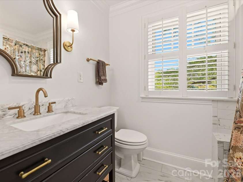 1642 Providence Road, Charlotte, NC 28207.  MLS# CAR4407918, YatesRealty ID 44256. Additional full bath upstairs