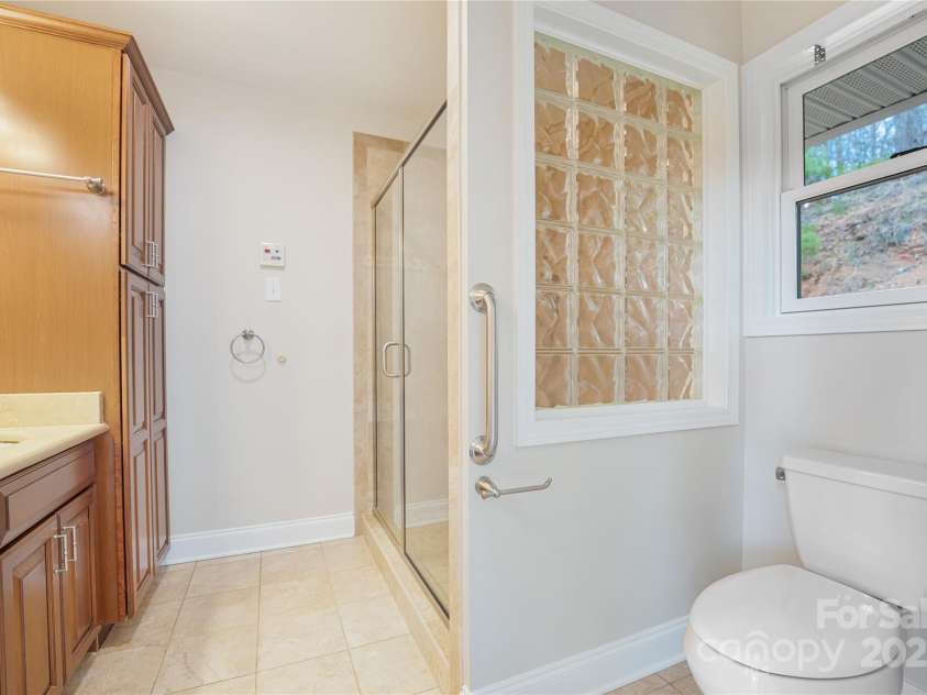 225 Seasons Drive, Clyde, NC 28721.  MLS# CAR4234231, YatesRealty ID 4426. Primary bathroom