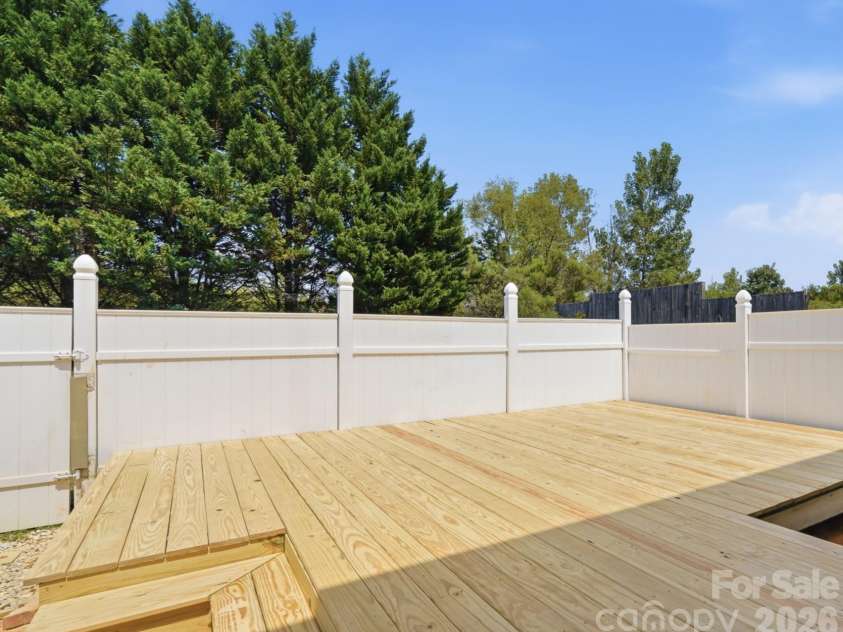4010 Lawrence Daniel Drive, Matthews, NC 28104.  MLS# CAR4410182, YatesRealty ID 44275. Large New Deck & Fenced Yard
