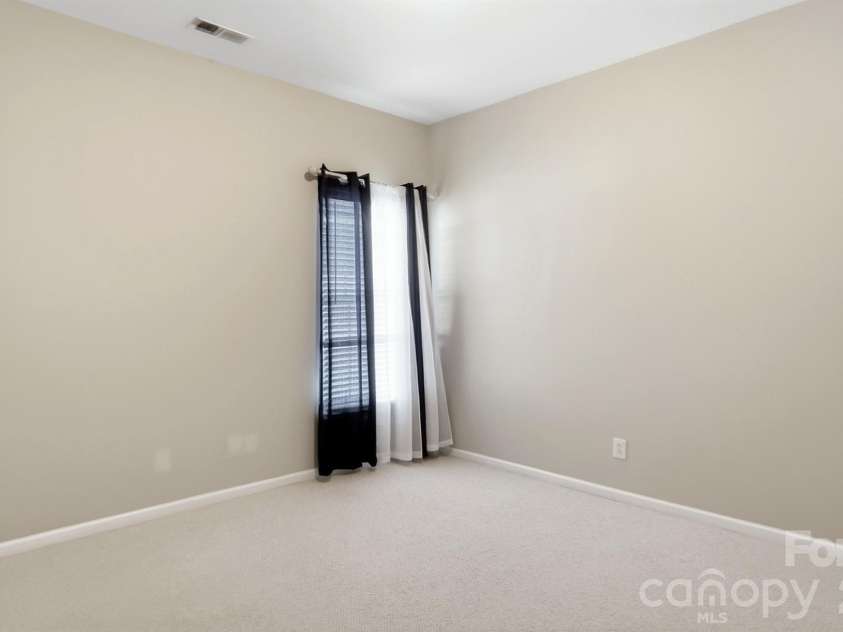 4010 Lawrence Daniel Drive, Matthews, NC 28104.  MLS# CAR4410182, YatesRealty ID 44275. Main Floor Bedroom & Bathroom