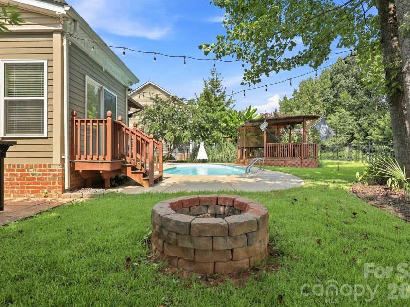 126 Misty Woods Drive, Clover, SC 29710.  MLS# CAR4414251, YatesRealty ID 44279. Firepit
