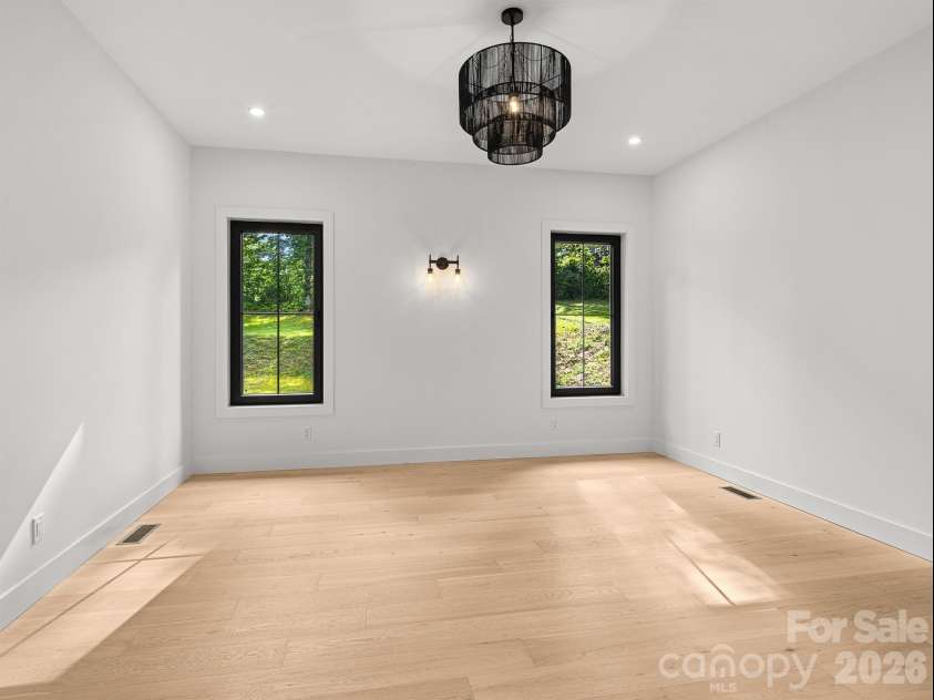 25 Copper Mill Court, Candler, NC 28715.  MLS# CAR4413961, YatesRealty ID 44287. Primary bedroom