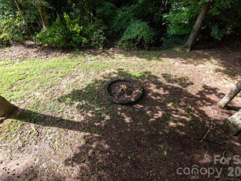 820 Clearview Court, Concord, NC 28025.  MLS# CAR4414589, YatesRealty ID 44296. Firepit