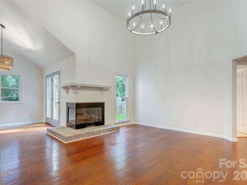 156 Edgewater Drive, Concord, NC 28027.  MLS# CAR4413561, YatesRealty ID 44298. Spacious living area with updated lighting