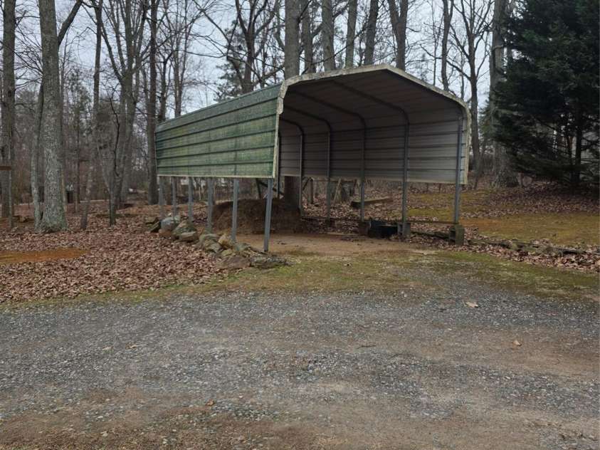 1044 Rabbit Trail, Gastonia, NC 28052.  MLS# CAR4334931, YatesRealty ID 4430. Carport side view 