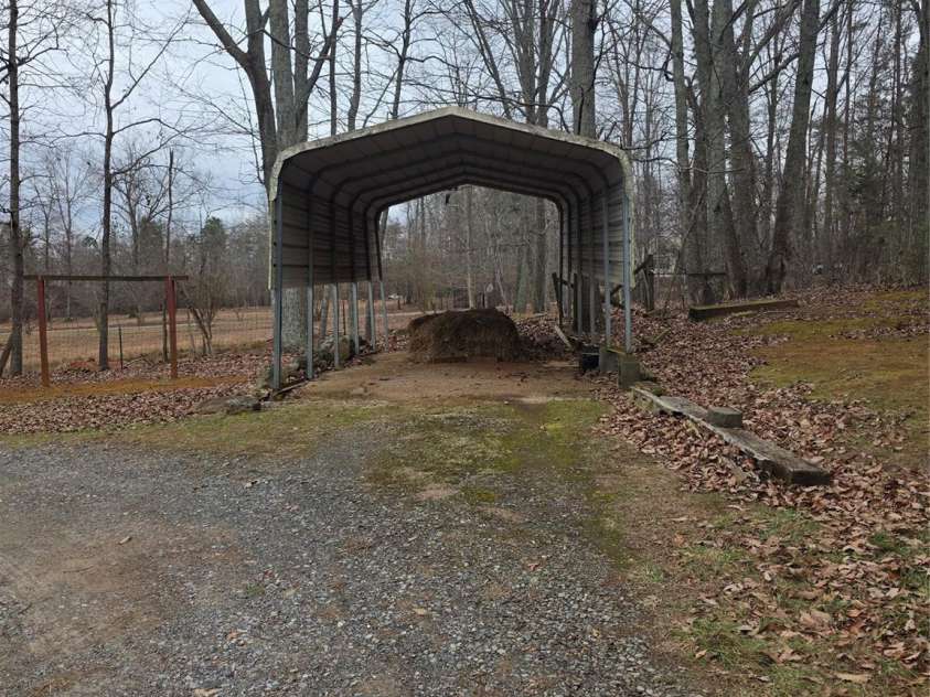 1044 Rabbit Trail, Gastonia, NC 28052.  MLS# CAR4334931, YatesRealty ID 4430. Carport straight view