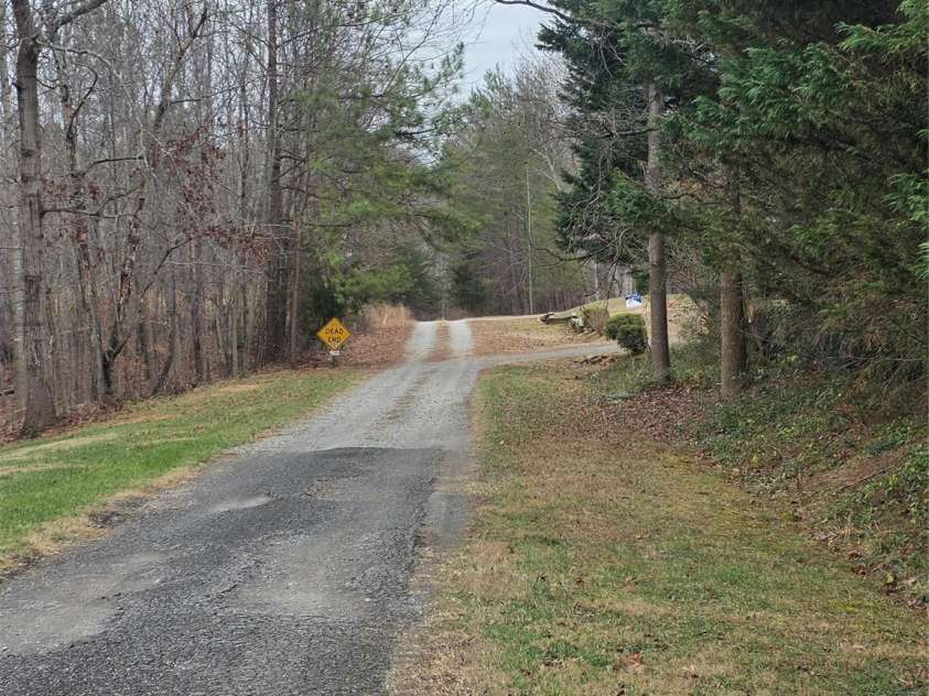 1044 Rabbit Trail, Gastonia, NC 28052.  MLS# CAR4334931, YatesRealty ID 4430. Shared gravel road rabbit trail. 