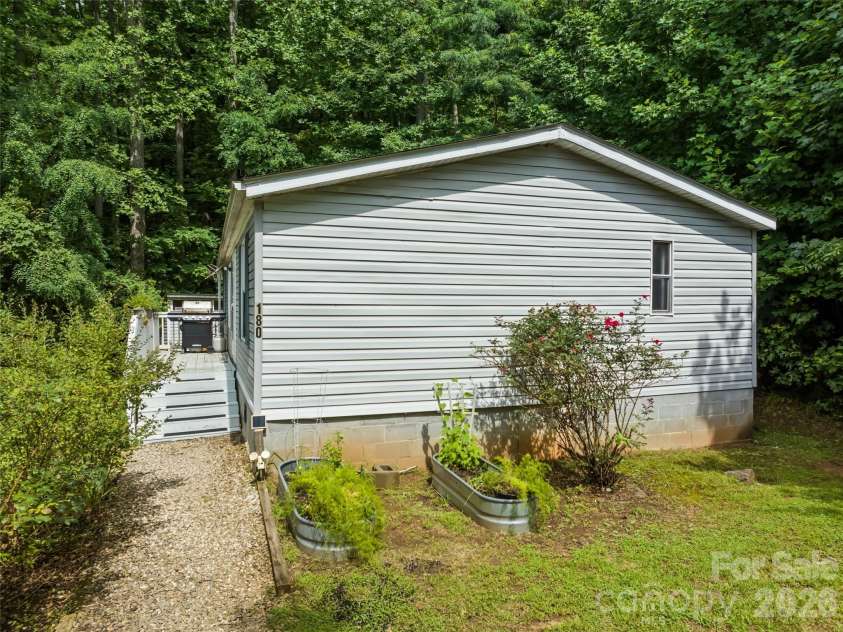 180 Hidden Meadow Drive, Candler, NC 28715.  MLS# CAR4412444, YatesRealty ID 44302. 