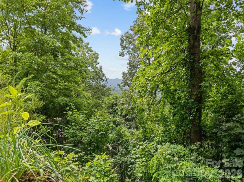 180 Hidden Meadow Drive, Candler, NC 28715.  MLS# CAR4412444, YatesRealty ID 44302. 