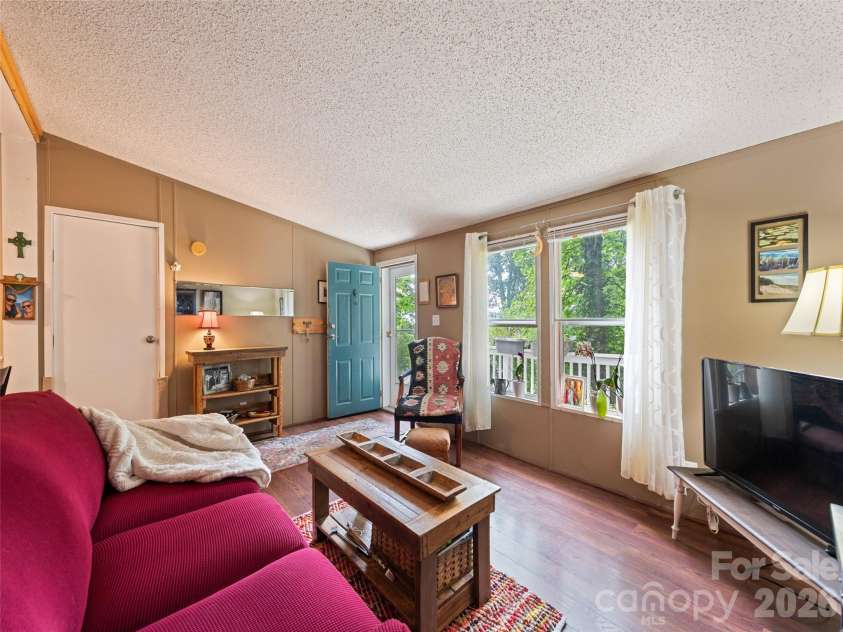 180 Hidden Meadow Drive, Candler, NC 28715.  MLS# CAR4412444, YatesRealty ID 44302. 