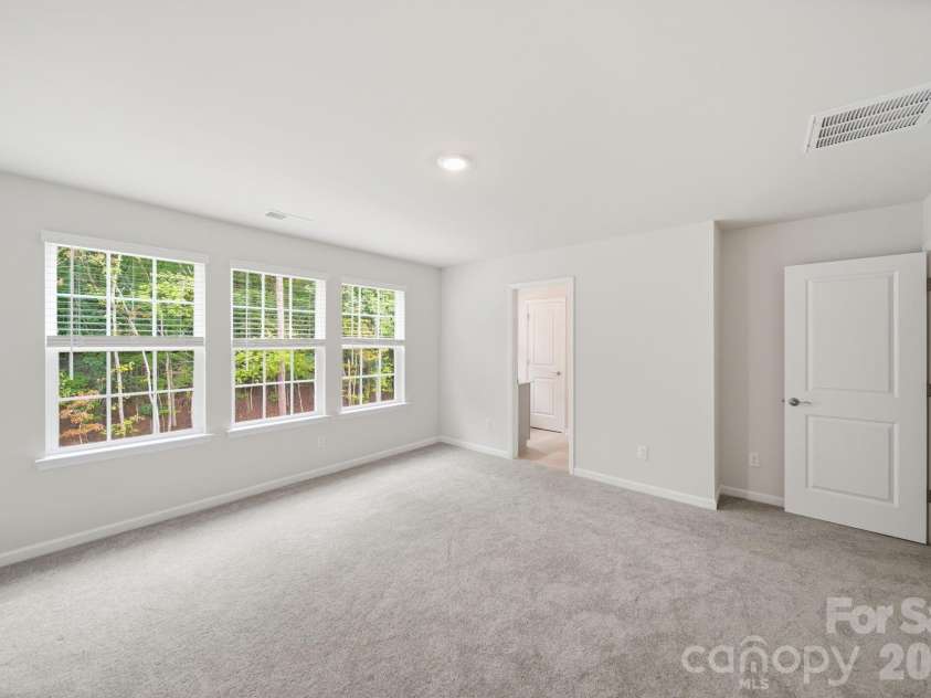 1131 Bandon Drive, Waxhaw, NC 28173.  MLS# CAR4409431, YatesRealty ID 44306. 3rd level primary bedroom