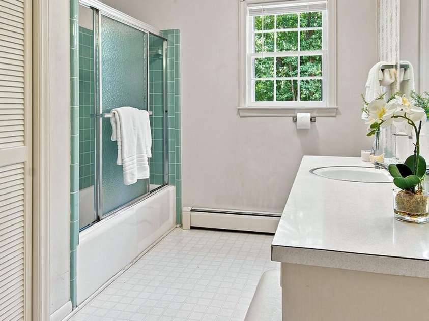 141 Elm Street, Mocksville, NC 27028.  MLS# CAR4414693, YatesRealty ID 44308. Full bath with tile shower