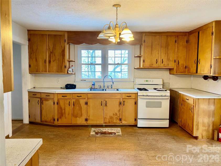 306 US Hwy 70A E Highway, Hildebran, NC 28637.  MLS# CAR4343164, YatesRealty ID 4431. OVERSIZED KITCHEN