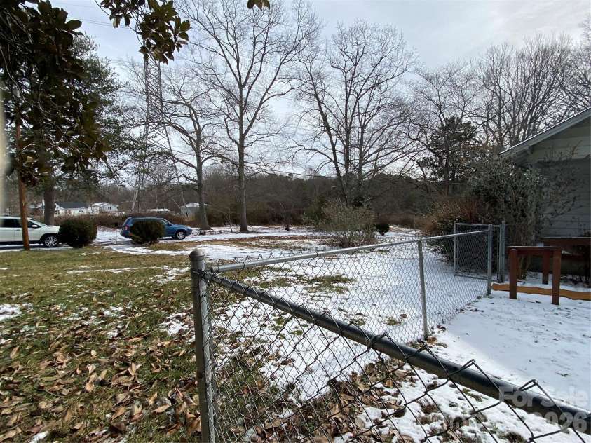 306 US Hwy 70A E Highway, Hildebran, NC 28637.  MLS# CAR4343164, YatesRealty ID 4431. SIDE YARD DRIVEWAY.