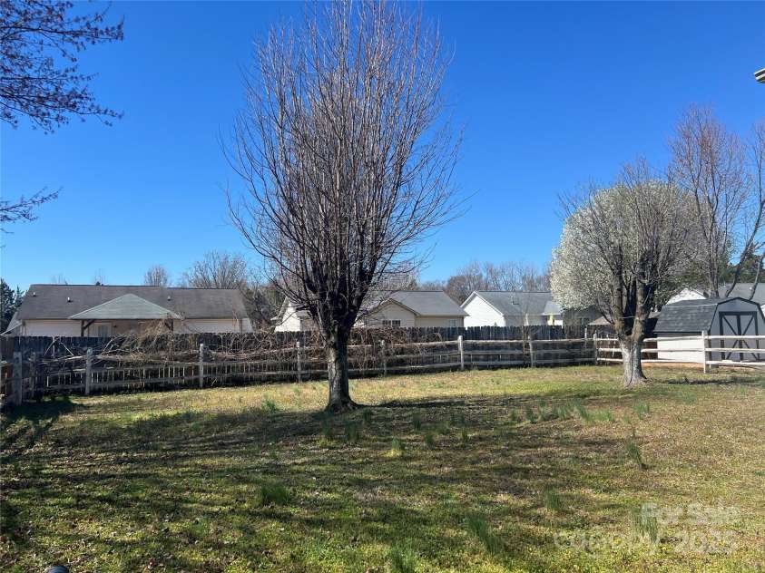 376 Brook Green Place, Concord, NC 28027.  MLS# CAR4230406, YatesRealty ID 4432. Backyard