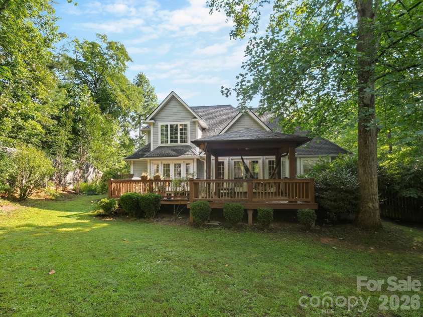 306 Golden Hawk Trail, Asheville, NC 28805.  MLS# CAR4413956, YatesRealty ID 44325. Backyard and back deck