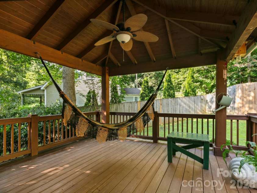 306 Golden Hawk Trail, Asheville, NC 28805.  MLS# CAR4413956, YatesRealty ID 44325. Covered back deck