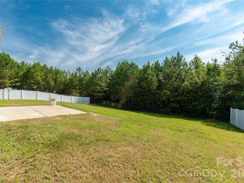6407 Hunting Creek Road, Lancaster, SC 29720.  MLS# CAR4408661, YatesRealty ID 44327. Backyard