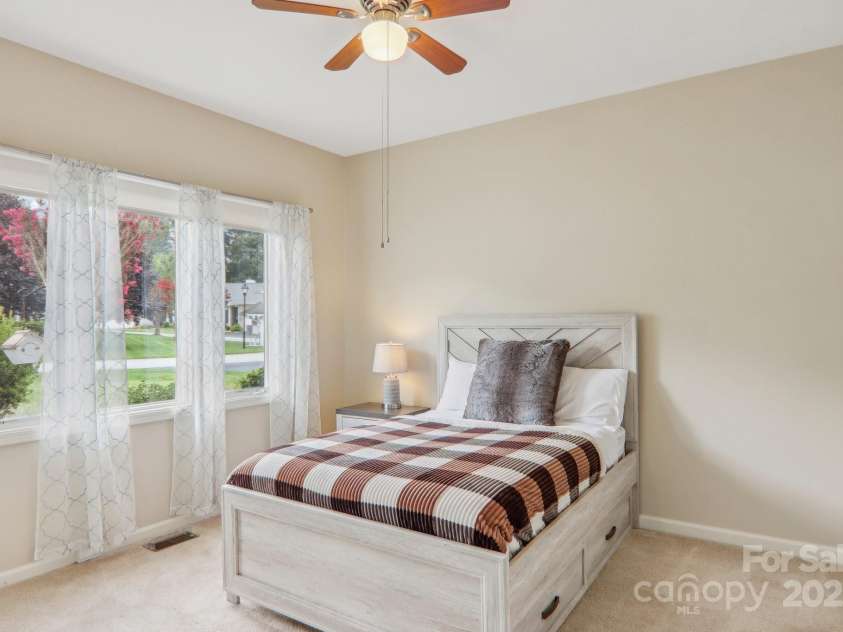 23 Country Meadows Lane, Hendersonville, NC 28792.  MLS# CAR4172601, YatesRealty ID 4433. Front bedroom