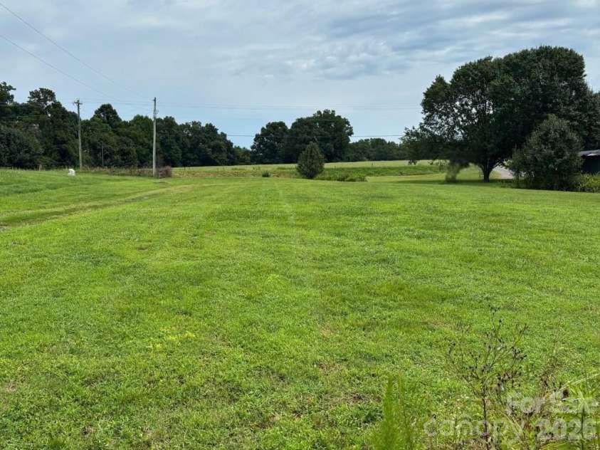 5191 US Highway 601 Highway, Mocksville, NC 27028.  MLS# CAR4414708, YatesRealty ID 44337. Front yard