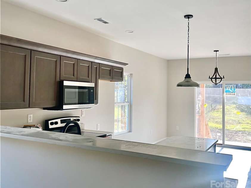 208 Nottingham Drive, York, SC 29745.  MLS# CAR4098642, YatesRealty ID 4434. Bar area looking into kitchen/dining