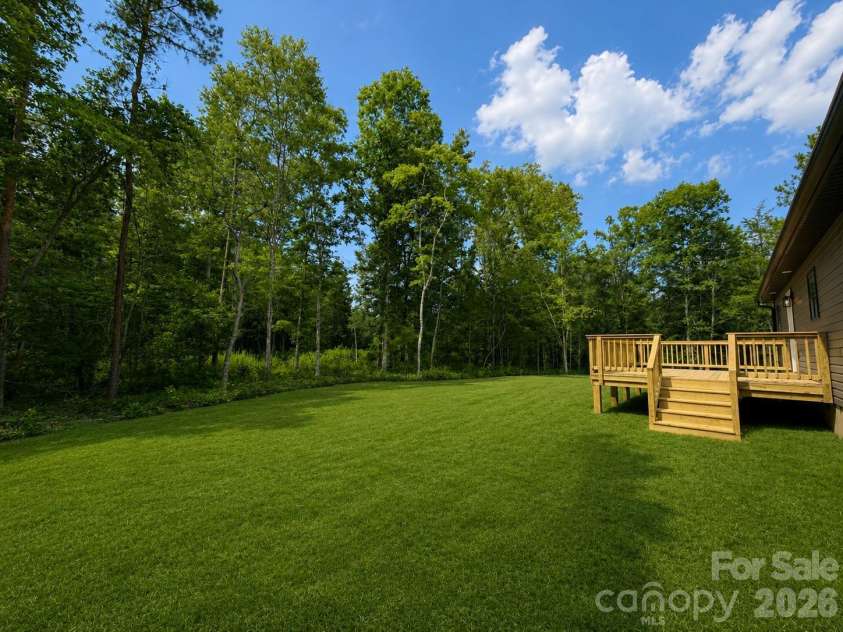 2697 Kendelwood Drive, Lancaster, SC 29720.  MLS# CAR4409067, YatesRealty ID 44346. Back yard*virtually added grass