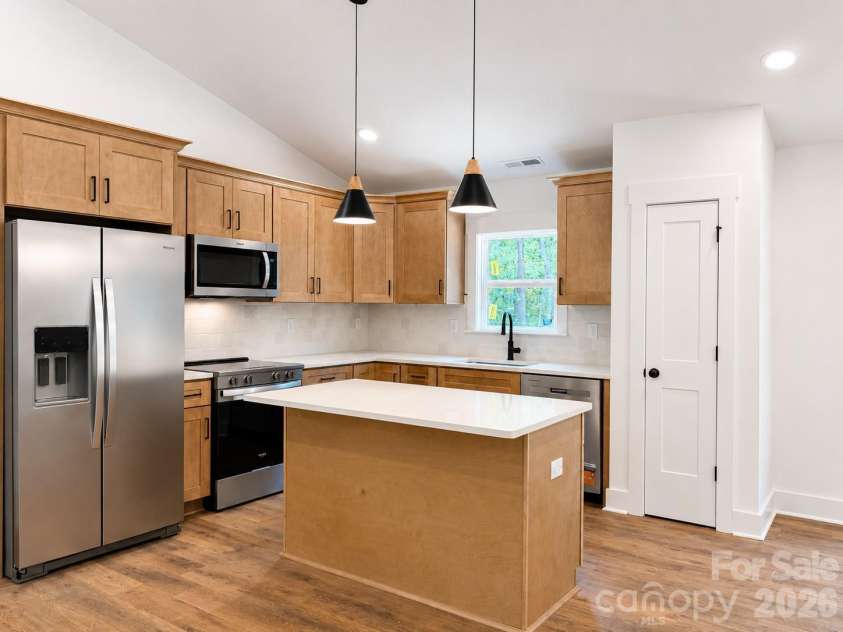 2697 Kendelwood Drive, Lancaster, SC 29720.  MLS# CAR4409067, YatesRealty ID 44346. Island with extra seating