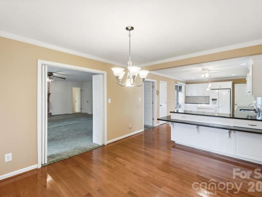 197 Park Road, Mount Holly, NC 28120.  MLS# CAR4414607, YatesRealty ID 44348. Dining Connected to Living & Kitchen