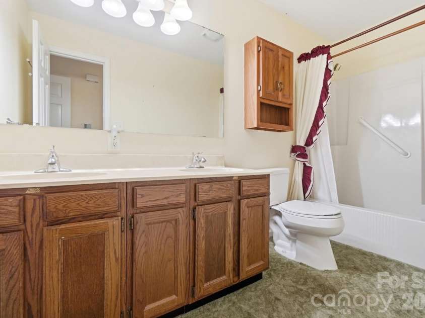 197 Park Road, Mount Holly, NC 28120.  MLS# CAR4414607, YatesRealty ID 44348. Hall Bath w Double Vanity