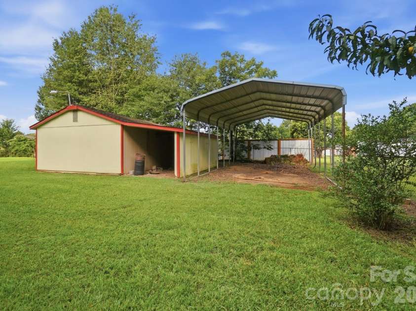 197 Park Road, Mount Holly, NC 28120.  MLS# CAR4414607, YatesRealty ID 44348. Two Additional Carport/Storage Areas