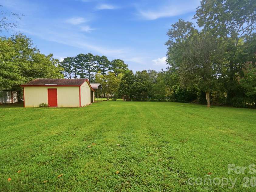 197 Park Road, Mount Holly, NC 28120.  MLS# CAR4414607, YatesRealty ID 44348. What a Backyard!