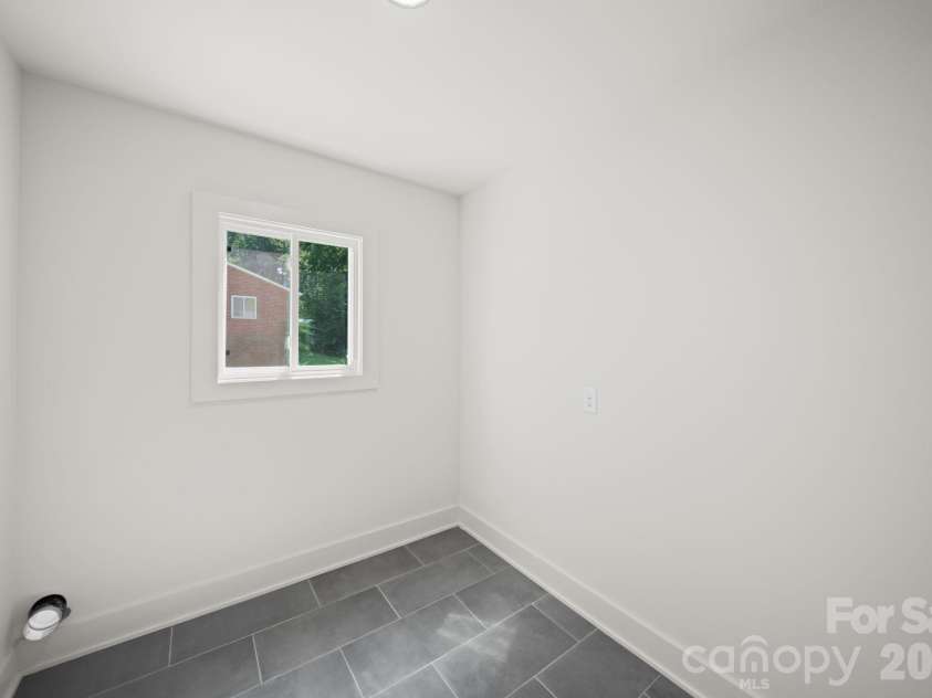1041 Watts Drive, Charlotte, NC 28216.  MLS# CAR4411321, YatesRealty ID 44365. Laundry Room