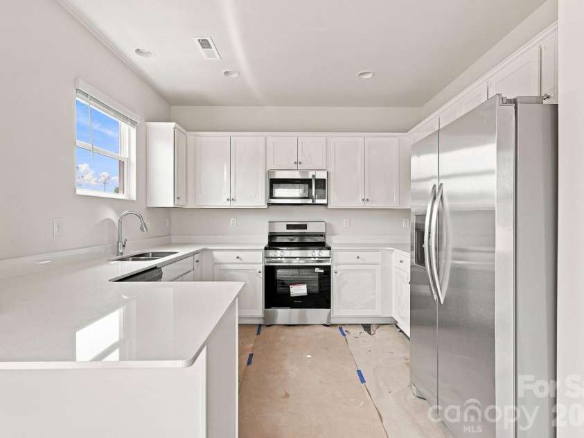 233 Planters Row Road, Iron Station, NC 28080.  MLS# CAR4411723, YatesRealty ID 44370. Kitchen