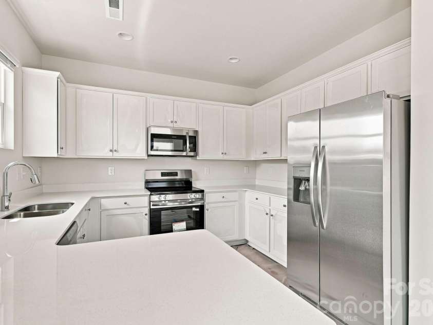233 Planters Row Road, Iron Station, NC 28080.  MLS# CAR4411723, YatesRealty ID 44370. Kitchen