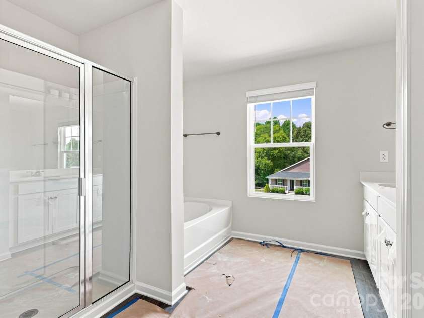 233 Planters Row Road, Iron Station, NC 28080.  MLS# CAR4411723, YatesRealty ID 44370. Primary bath