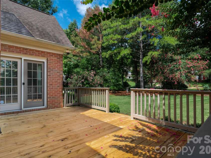 12818 Darby Chase Drive, Charlotte, NC 28277.  MLS# CAR4412364, YatesRealty ID 44377. New decking boards