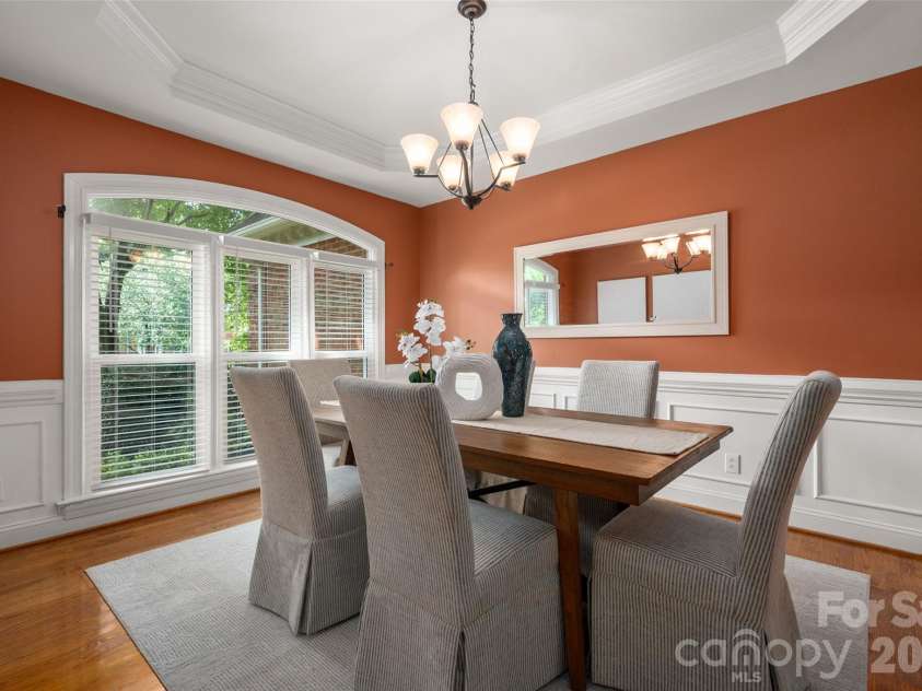 12818 Darby Chase Drive, Charlotte, NC 28277.  MLS# CAR4412364, YatesRealty ID 44377. Spacious dining room with tray ceiling.