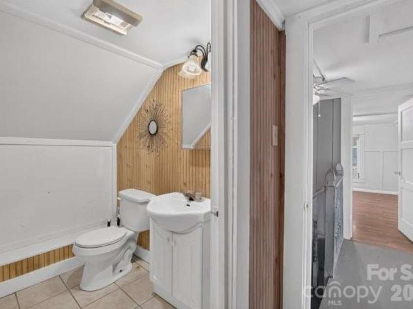 403 Spruce Street, Lenoir, NC 28645.  MLS# CAR4412597, YatesRealty ID 44388. Half Bath Upstairs