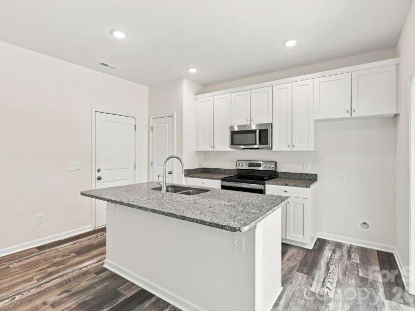 2604 Greencrest Lane, Statesville, NC 28677.  MLS# CAR4389908, YatesRealty ID 44406. Kitchen