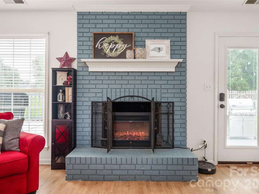 3209 Monte Drive, Monroe, NC 28110.  MLS# CAR4412085, YatesRealty ID 44411. Electric fireplace insert