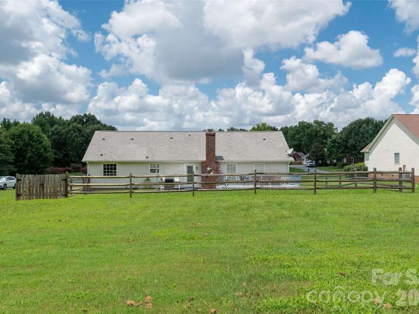 3209 Monte Drive, Monroe, NC 28110.  MLS# CAR4412085, YatesRealty ID 44411. Large flat lot with tons of potential