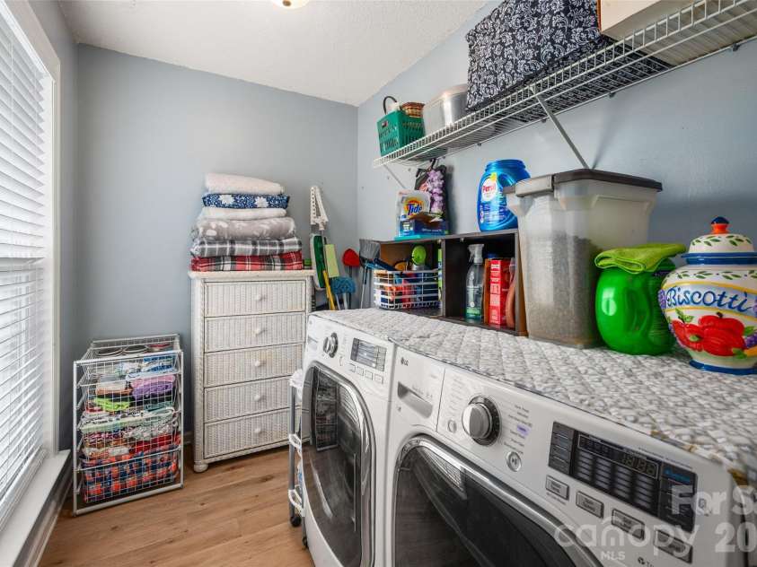 3209 Monte Drive, Monroe, NC 28110.  MLS# CAR4412085, YatesRealty ID 44411. Laundry room with stoarage space