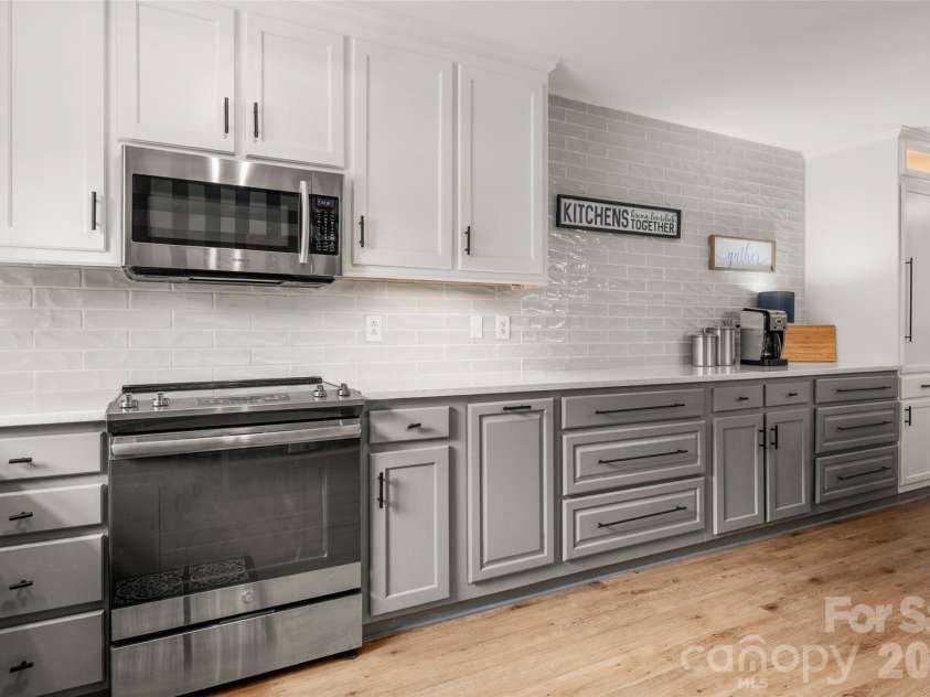3209 Monte Drive, Monroe, NC 28110.  MLS# CAR4412085, YatesRealty ID 44411. Quartz countertops and ss appls