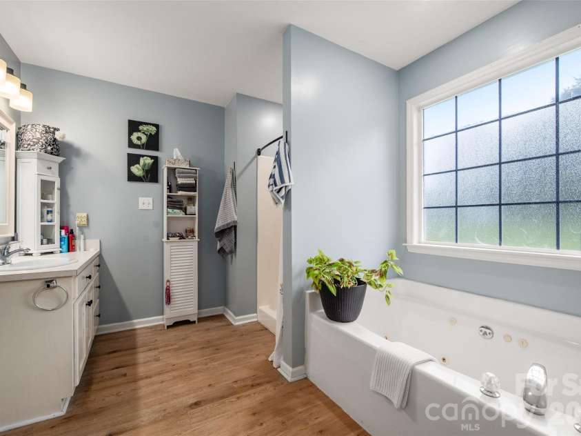 3209 Monte Drive, Monroe, NC 28110.  MLS# CAR4412085, YatesRealty ID 44411. Soaking tub and separate shower