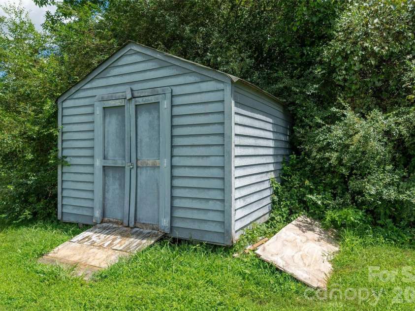3209 Monte Drive, Monroe, NC 28110.  MLS# CAR4412085, YatesRealty ID 44411. Storage shed