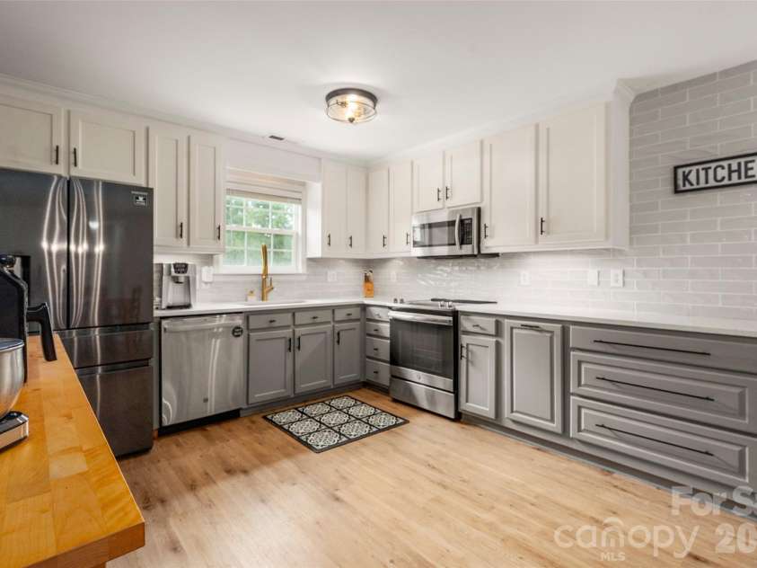 3209 Monte Drive, Monroe, NC 28110.  MLS# CAR4412085, YatesRealty ID 44411. Updated modern kitchen