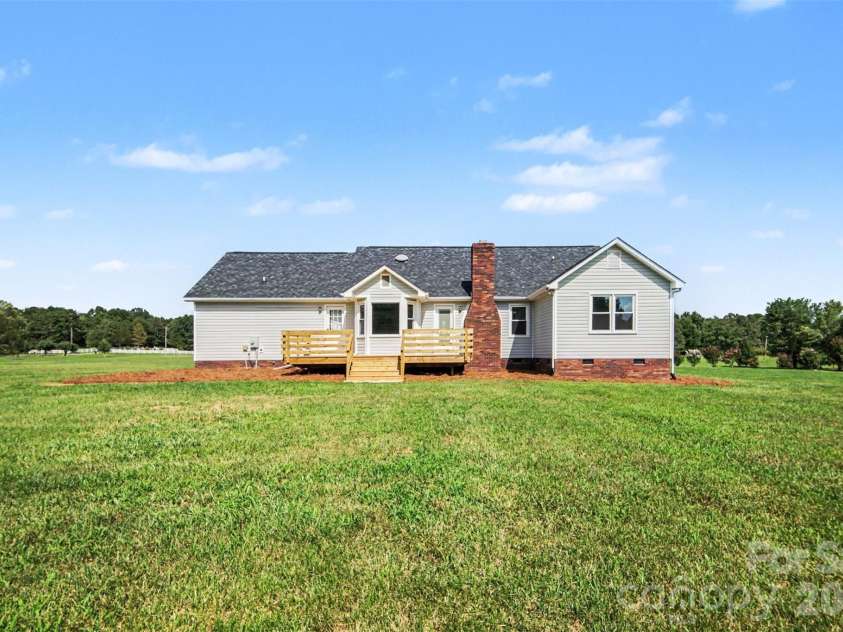 8379 Harvell Road, Stanfield, NC 28163.  MLS# CAR4410609, YatesRealty ID 44417. Expansive backyard with brand new deck