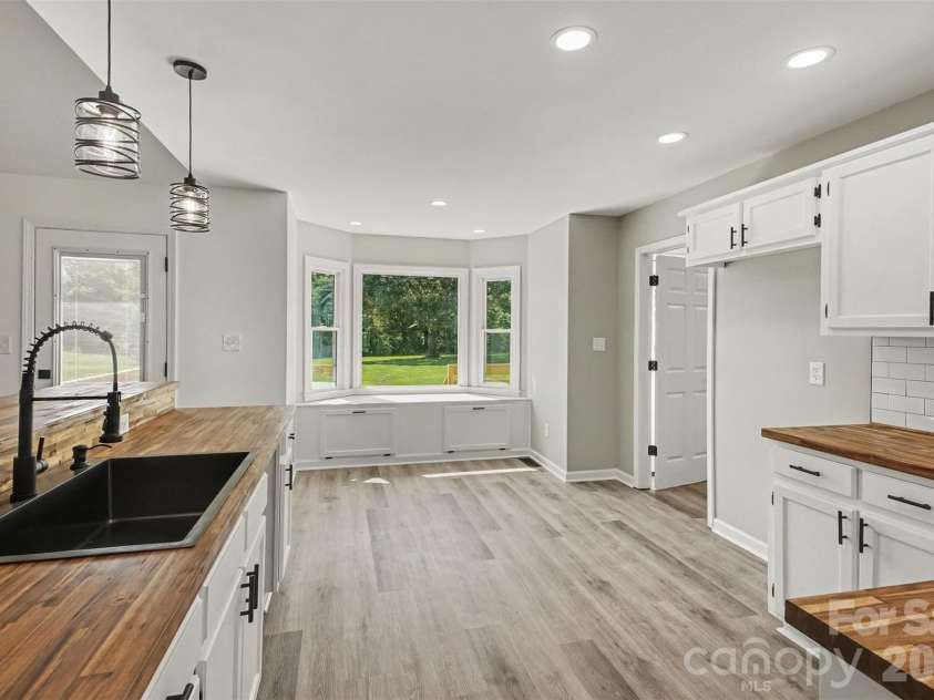 8379 Harvell Road, Stanfield, NC 28163.  MLS# CAR4410609, YatesRealty ID 44417. Kitchen with deep farmhouse sink